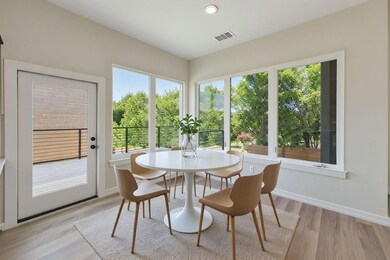 Dining area with light wood finished floors, heal