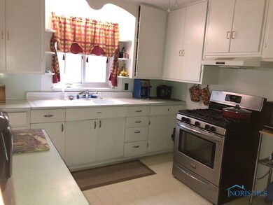 Kitchen offers tons of cupboard space