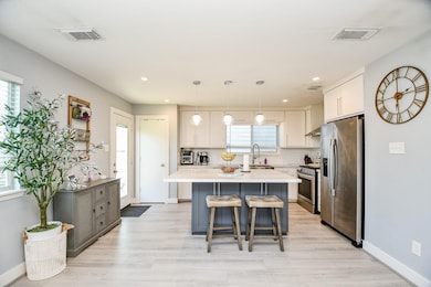 Dine and gather in this stunning kitchen.