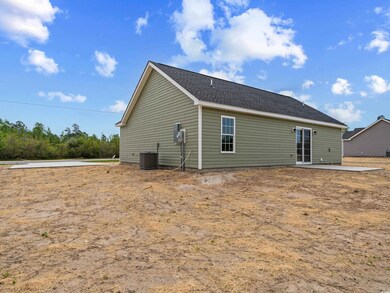 Rear view of property featuring central air condition unit and a patio
