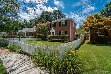 Picture perfect white picket fence and beautifully