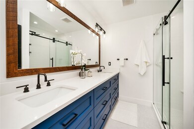 Owner's en-suite has this cool custom built mirror