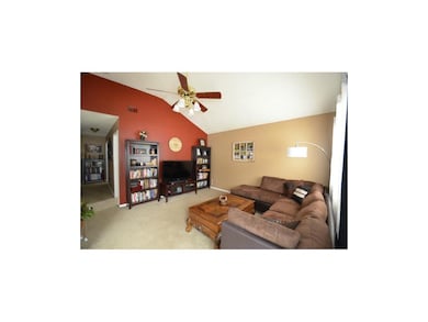 Large living room with newer carpet and awecome va