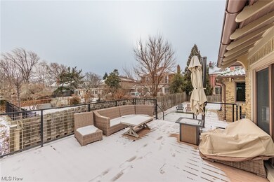 View of terrace featuring an outdoor hangout area and a grill