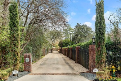This stunning flag lot entrance is located just of