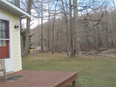 SIDE DECK WITH VIEW OF STREAM