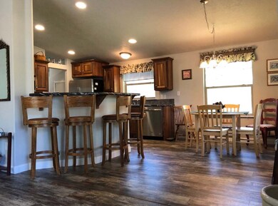 Dining & Kitchen Area With Breakfast Bar
