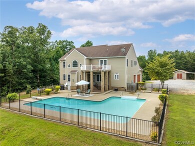 In-ground pool with safety fence