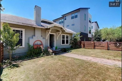 View of front of house featuring a front yard, fe
