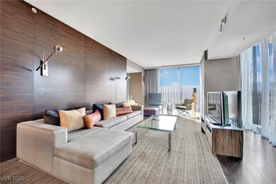 Living room with wood finished floors and floor to
