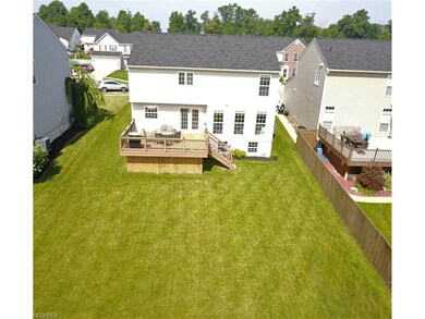 The back yard is spacious and perfect for kids and