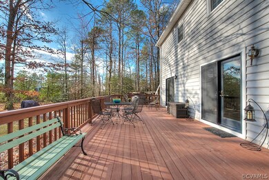 Enjoy views of the spacious yard from this oversiz