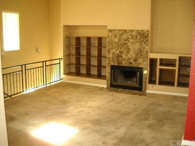 Living Room..stairs lead to Game room in basement