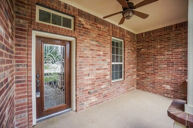 A large covered front porch with a ceiling fan, and solid wood front door with decorative beveled glass will welcome you and your guests. Take a look inside - you will not be disappointment!