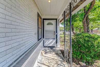 A charming covered front porch makes the ultimate