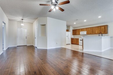Beautiful Wood Flooring in Entryway, Living Room a