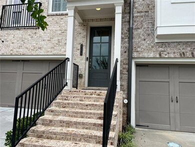 Property entrance with brick siding