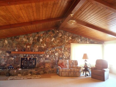 Natural stone fireplace wall