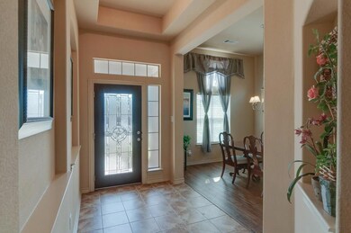 A Beautiful Front Door and Custom Ceiling Treatmen