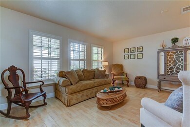 Front Living Room ~ Plantation Shutters Throughout