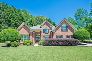 Two-story brick and Hardiplank home in a golf course community in Forsyth County