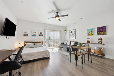 Bedroom with wood finished floors