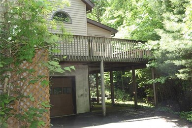Amazing deck AND extra lower level garage.