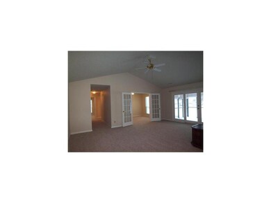 Living Room. With fresh paint, new carpet and vaul