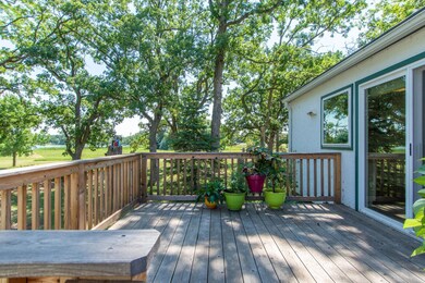 A newer deck provides a great spot to enjoy the yard and views of Crow Wing Lake.