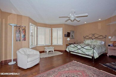 Cherry Wood Floors in Master Bedroom