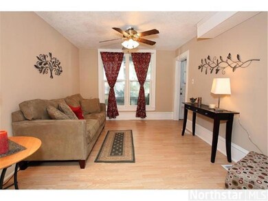 Living room with open floor plan into dining room 