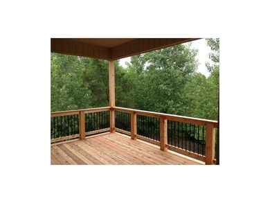 View of treed lot from covered deck!