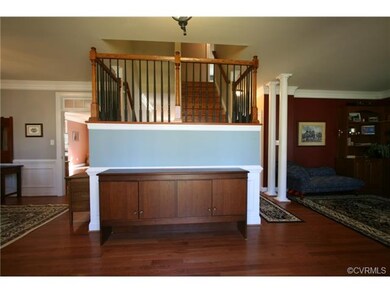 Entrance Foyer opens to Living Room and Dining Roo