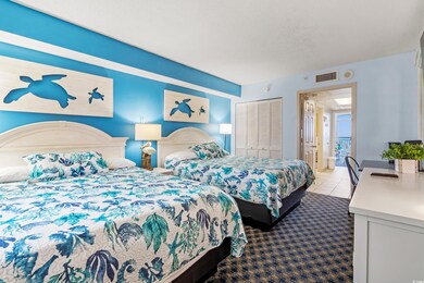 Carpeted bedroom featuring tile patterned floors