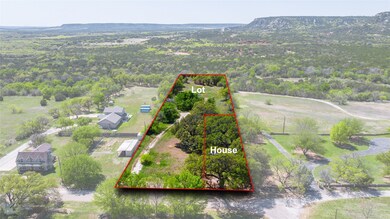 210 William Lot and
226 House with .50 acres