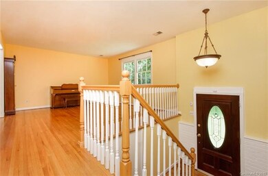 Charming split-foyer leads to formal living room!