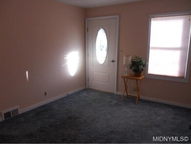 Liv Rm-hardwood under carpet