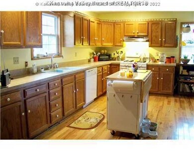 Kitchen. Abundant amount of cabinetry and counter