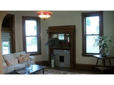 Family Room. Updated fireplace with smokey glass s