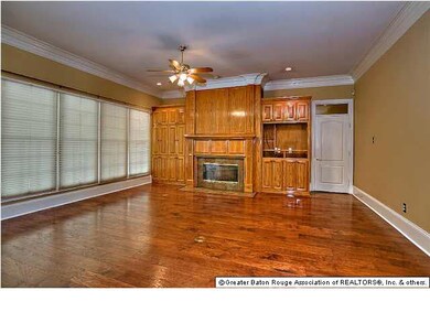 CUSTOM BUILT-INS AROUND THE WOOD BURNING FIREPLACE