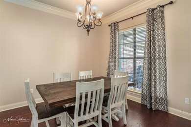 Dining area featuring dark hardwood / wood-style f