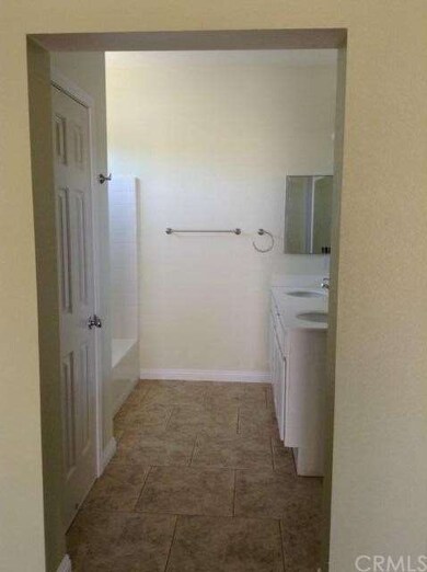 Master bathroom offers lots of storage space and n