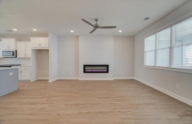 WOW!  Just look at all the natural light coming through.  Blinds are included in this home.