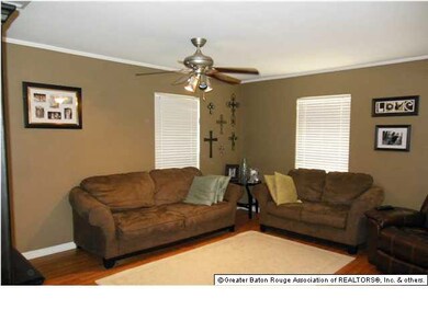 Family room with wood floors