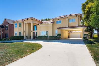 Beautiful Mediterranean-style exterior with a grand presence, featuring a sweeping driveway, elegant rooflines, and plenty of curb appeal. The home sits proudly on a spacious lot with a bright, inviting façade.
