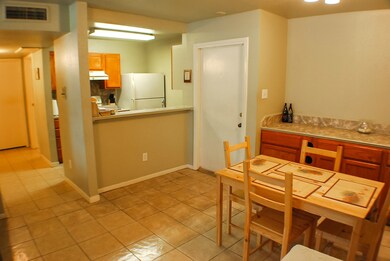Front door to unit to your right. Kitchen opens to