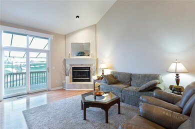 Gas fireplace, large sliding glass windows with su