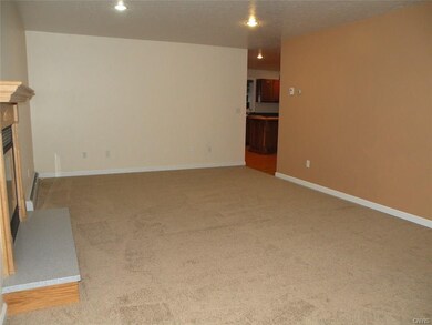 Living room with propane fireplace.