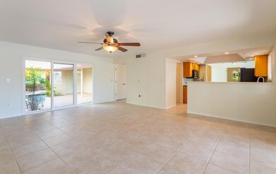 SPACIOUS LIVING ROOM OPEN TO THE KITCHEN