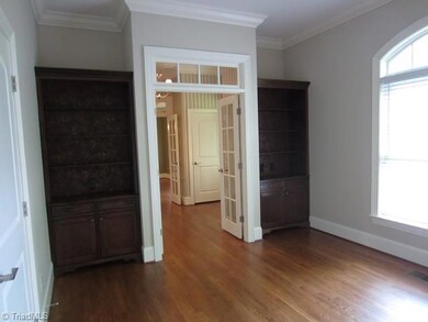 Library.  Beautiful built-in cabinets add to the usefulness of this room, which makes a great downstairs office or just a 